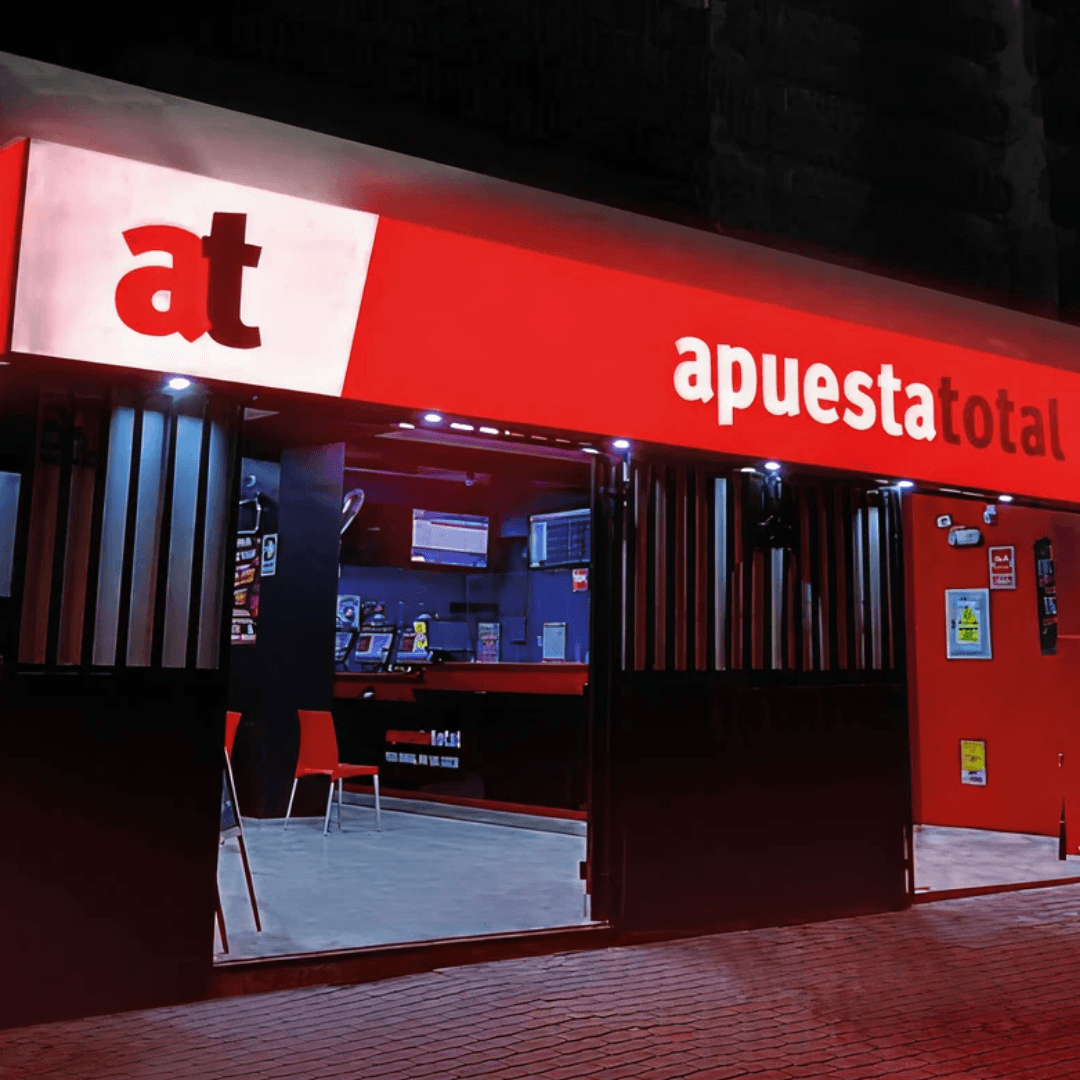 local de apuesta total cliente y caso de éxito de attach group